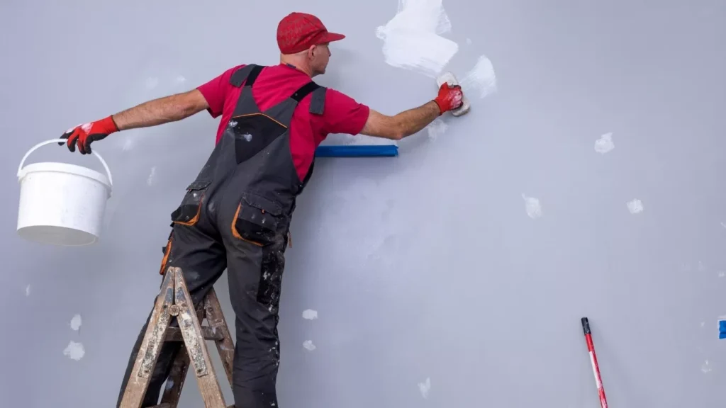 Skilled team providing home painting services for wall finishing
